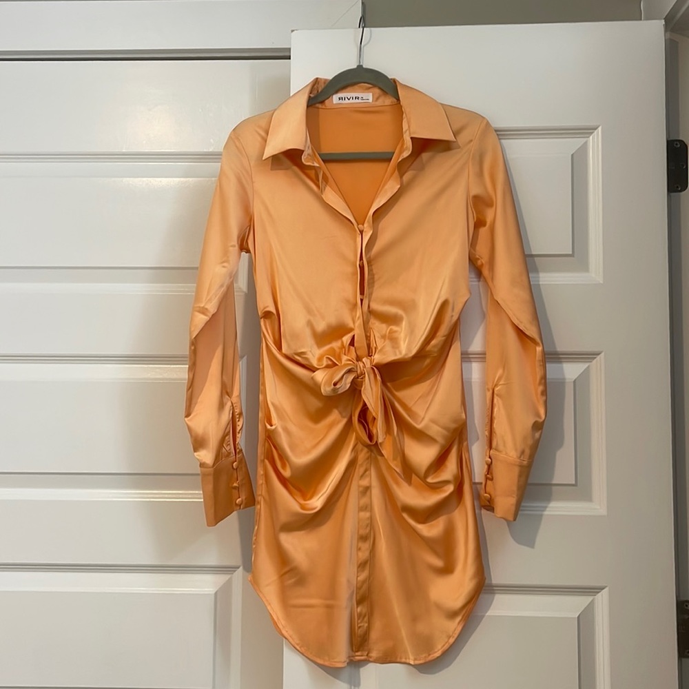 Satin orange dress. Never been worn before.
